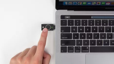 Ykbioc overhead macbook left finger